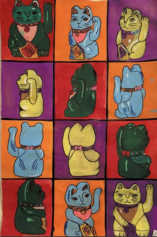 Painted grid of twelve lucky cat figurines, student artwork
